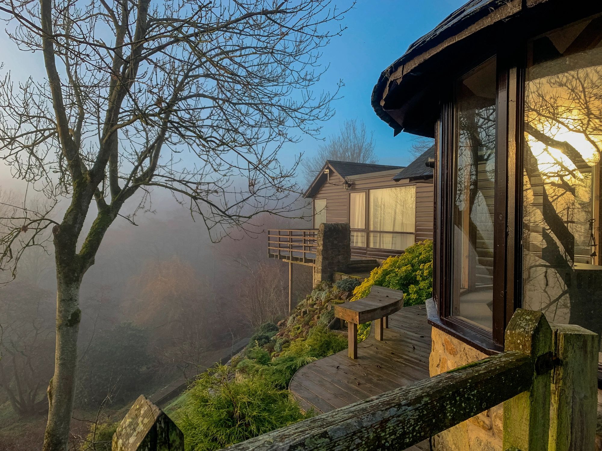 Luxury Tennessee cabin rental with panoramic windows and upscale lodge design