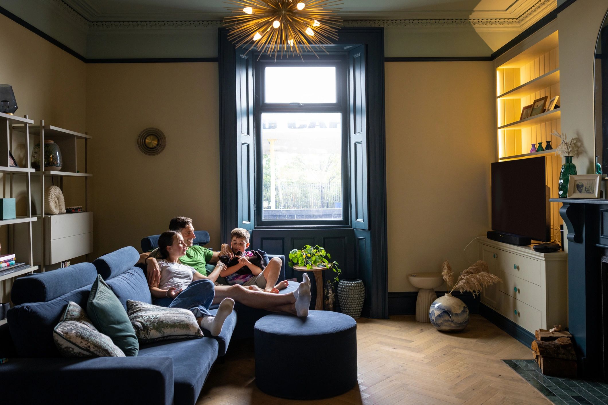 Family relaxing in a spacious Nashville area vacation rental living room